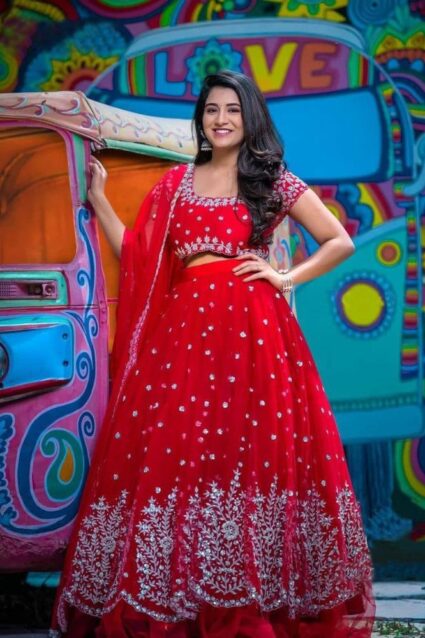 Attractive Red Lehenga Choli With Ruffled Flared Border Detailing