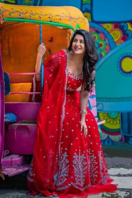 Attractive Red Lehenga Choli With Ruffled Flared Border Detailing