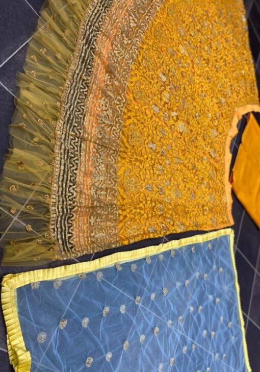 Yellow Color Charming Lehenga Choli On Net Ruffle With Embroidery Work