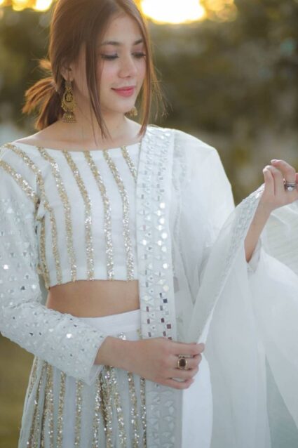 White Color Charming Lehenga Choli On Georgette With Sequin And Embroidery Work