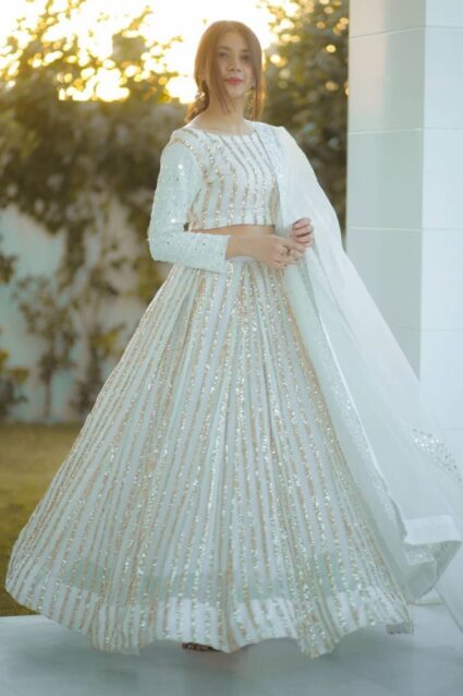 White Color Charming Lehenga Choli On Georgette With Sequin And Embroidery Work