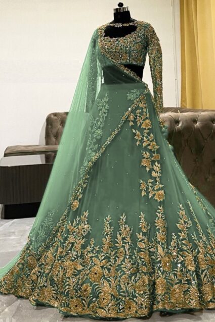 Green Color Lehenga Suit On Georgette With Embroidery And Moti Work
