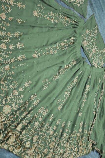 Green Color Lehenga Suit On Georgette With Embroidery And Moti Work