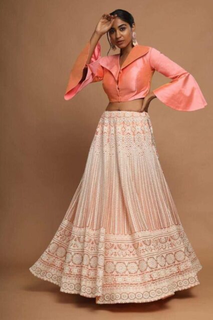Peach Color Stylish Lehenga Choli On Butterfly Net With Heavy Chainstitched Work