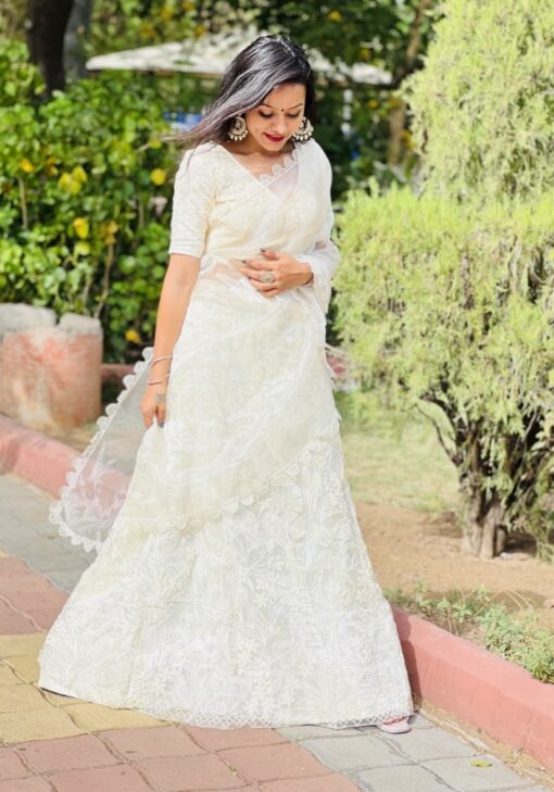 White Color Lehanga On Organza With Embroidery Work