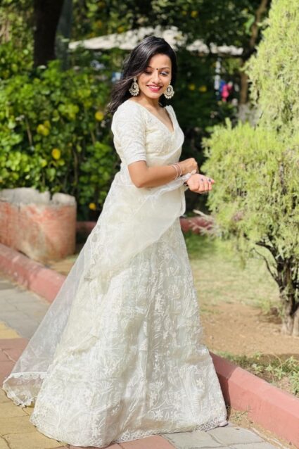 White Color Lehanga On Organza With Embroidery Work