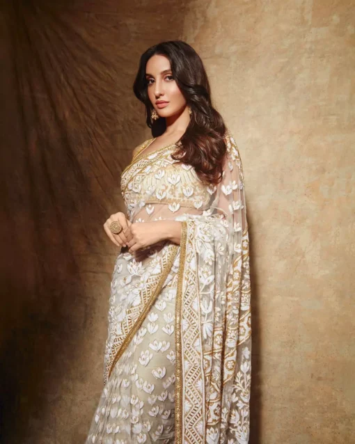 Celeb Nora Fatehi Drapes Sequin Saree for Party Wear