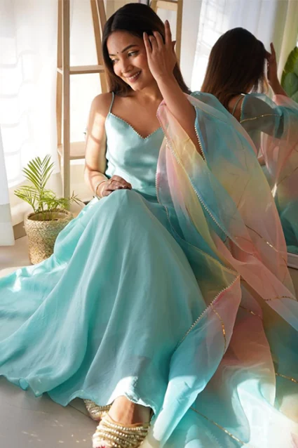 Trendy Sleeveless Tiffany Blue Suit With Organza Dupatta Trendy Sleeveless Tiffany Blue Suit With Organza Dupatta