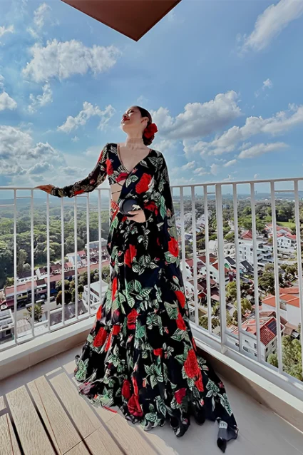 Exquisite Black Ruffled Saree With Magnificient Floral Prints