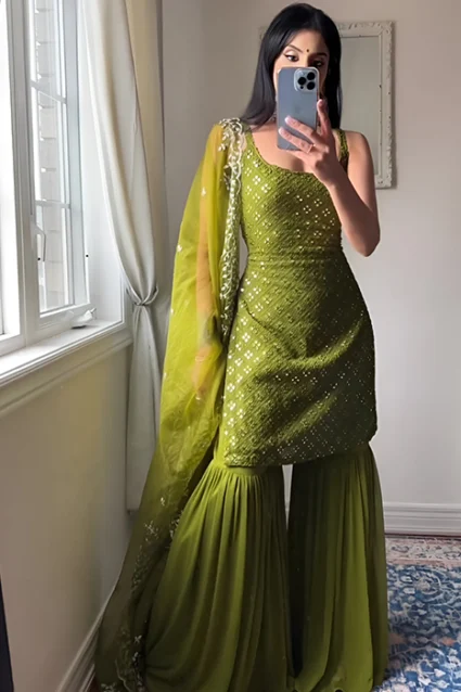 Shop Punjabi Sleeveless Sharara Suit With Zari Butta For Mehendi Shop Punjabi Sleeveless Sharara Suit With Zari Butta For Mehendi