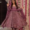 Image of Joy Purple Muslin Suit Set Deep Purple Muslin Kurta with Straight Pants and Dupatta displayed with matching accessories and styling for ethnic wear collection.