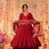 Image of Kaashi Bright Suit Set Vibrant Red Ethnic Set with Contrast Dupatta displayed with matching accessories and styling for ethnic wear collection.