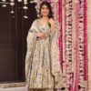 Image of Green leaf print cotton suit set Green Cotton Suit Set displayed with matching accessories and styling for ethnic wear collection.