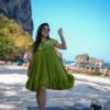 Image of Halcyon green crepe dress Green Dress displayed with matching accessories and styling for ethnic wear collection.