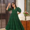 Image of Garnet green cotton dress Green Cotton Dress displayed with matching accessories and styling for ethnic wear collection.