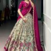 Fashionable Model Wearing Cream Kalamkari Lehenga.jpg