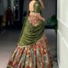 Back view of this stunning rust orange kalamkari half saree lehenga