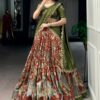 Front styled look of this elegant rust orange kalamkari lehenga