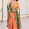 Stylishly posed model wearing Orange Russian Silk Digital Floral Printed Anarkali Gown for a glam...