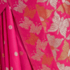 Rani Pink Banarasi Silk Saree with Zari Weaving Work | Close-up of the saree's intricate designs,...