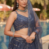 Detailed view of embroidered motifs on this designer lehenga choli