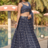 Close-up of intricate embroidery on grey georgette lehenga choli