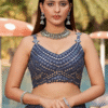 Elegant styling with grey georgette lehenga choli and matching jewelry