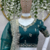 Green Bridal Lehenga Choli with Heavy Embroidery Close-Up of Border.jpg
