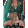 Green Bridal Lehenga Choli with Heavy Embroidery Front View with Jewelry.jpg