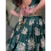 Green Bridal Lehenga Choli with Heavy Embroidery Close-Up of Dupatta.jpg