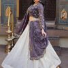 Close-up of intricate embroidery on lehenga fabric