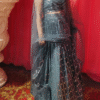 Sweeping back view of grey georgette lehenga choli for a dramatic look