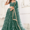 Vibrant green lehenga choli set with mirror work detail