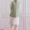 Close-up View of Elegant White Silk Kurta with Pista Green Jacket, Showcasing the Fine Details of...