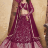 A Close-Up Shot Of The Rani Pink Foil Print Lehenga Choli's Intricate Embellishments & Delicate W...
