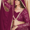 A Top-Down Shot Of The Rani Pink Lehenga Choli Outfit Featuring Its Sparkling Foil Print Embellis...
