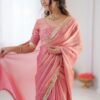 Peach Lace Border Saree Set in Motion: A Model Models this Vibrant Sari and Blouse Combination, P...
