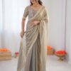 Closer look at intricate grey beads on silk saree fabric