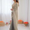 Gorgeous grey bead silk saree draped elegantly around a model