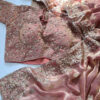 Pink satin silk saree back view with intricate design