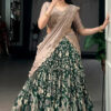 Close-up of Kalamkari print silk lehenga choli highlights stunning kalamkari work on the fabric, ...