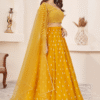 Vibrant Yellow Haldi Lehenga Choli with Intricate Thread Embroidery Work on the Flared Bottom and...